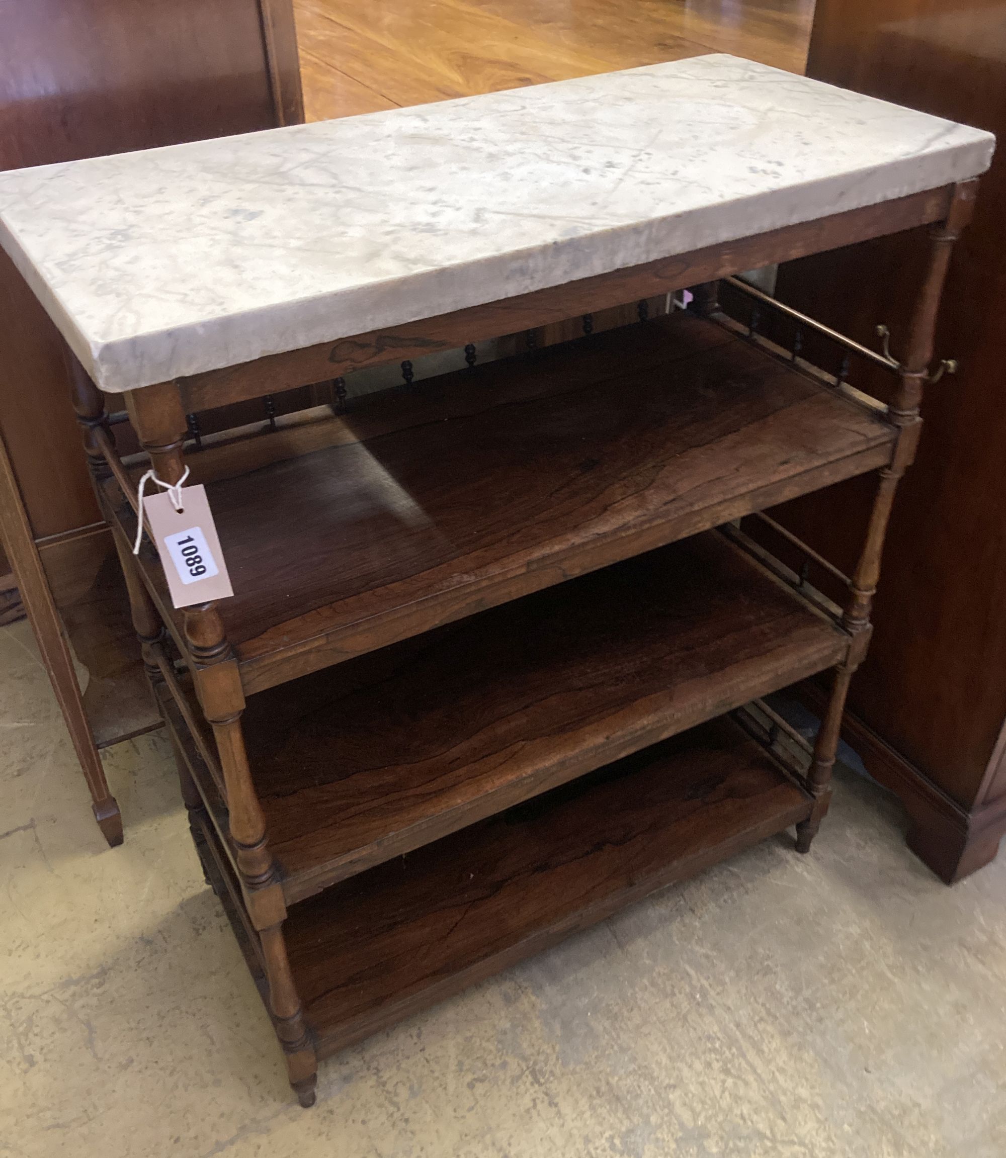 A Victorian rosewood three tier whatnot with marble top, width 69cm, depth 32cm, height 83cm